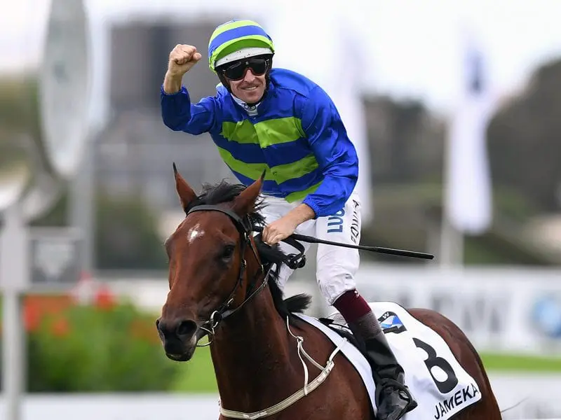 Jockey Hugh Bowman riding Jameka 2 celebrates his win in The BMW