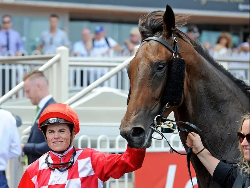 Catchy ridden by jockey Craig Williams(left)