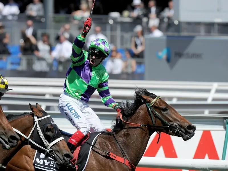 Jockey Dean Yendall celebrates on I AM A Star