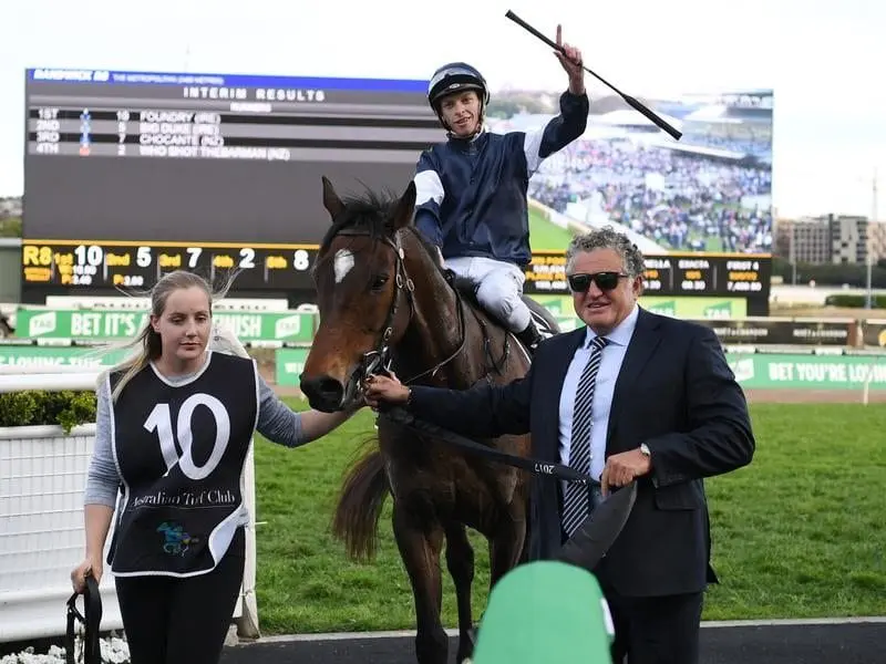 Jockey Michael Dee on Foundry gestures after winning.