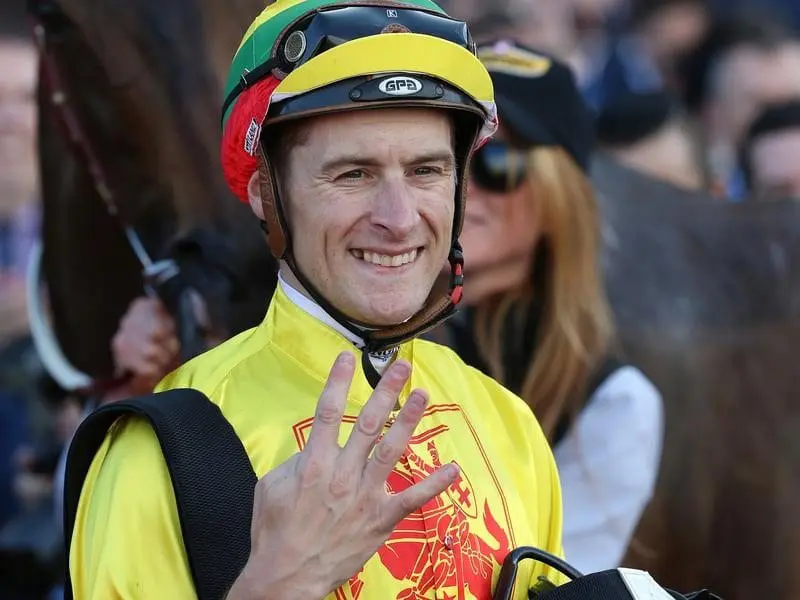 Blake Shinn celebrates riding four winners on Cox Plate day.