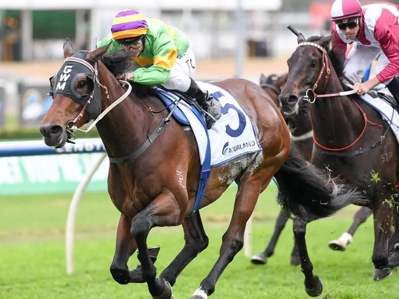 Jockey Tim Clark riding Classic Uniform to win race 9