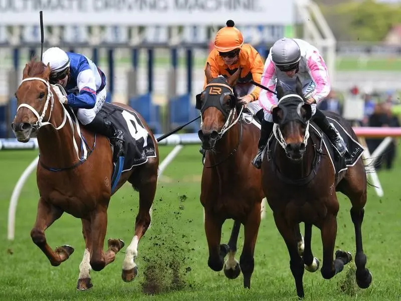 Destinys Kiss (right) wins the City Tattersalls Cup at Randwick.