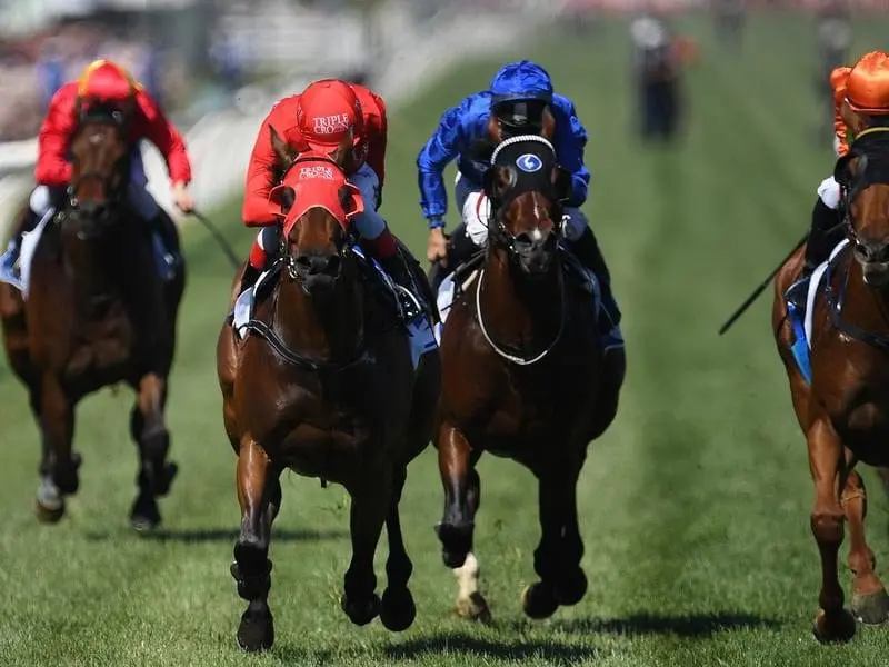 Redzel (left) wins the Darley Classic.