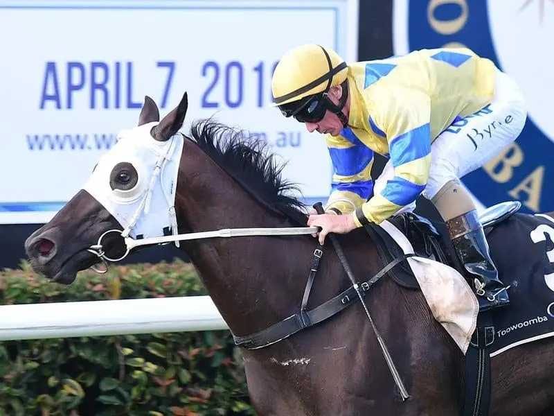 Jockey Jim Byrne rides Hang to the finish.