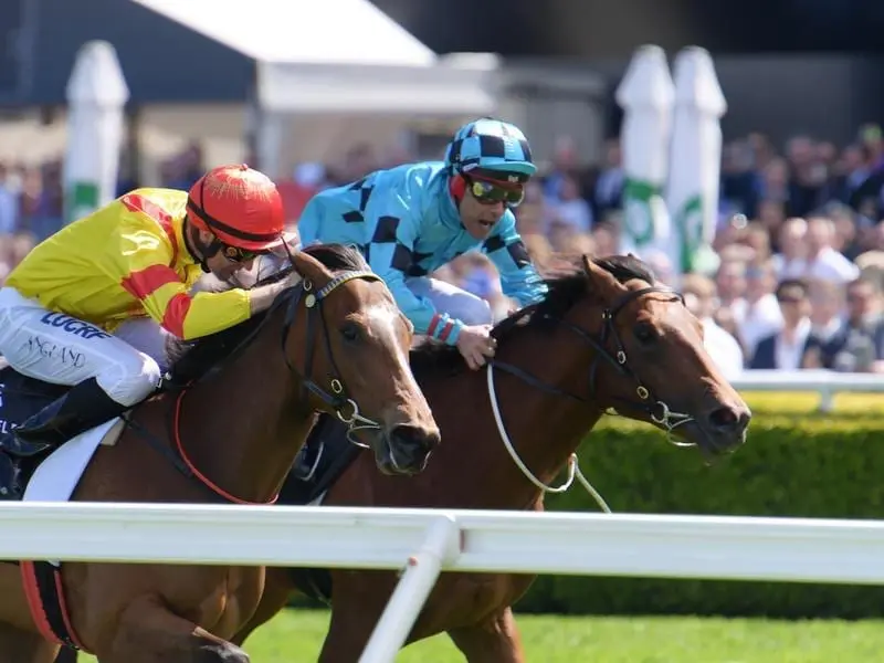 Dubious (right) wins at Randwick.