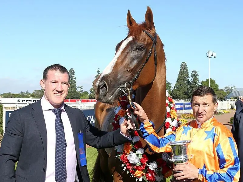 Cronulla Sharks captain Paul Gallen (L) and jockey Opie Bosson