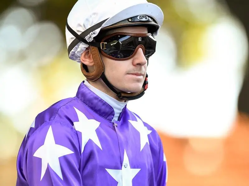 Jockey Jason Collett in the mounting yard