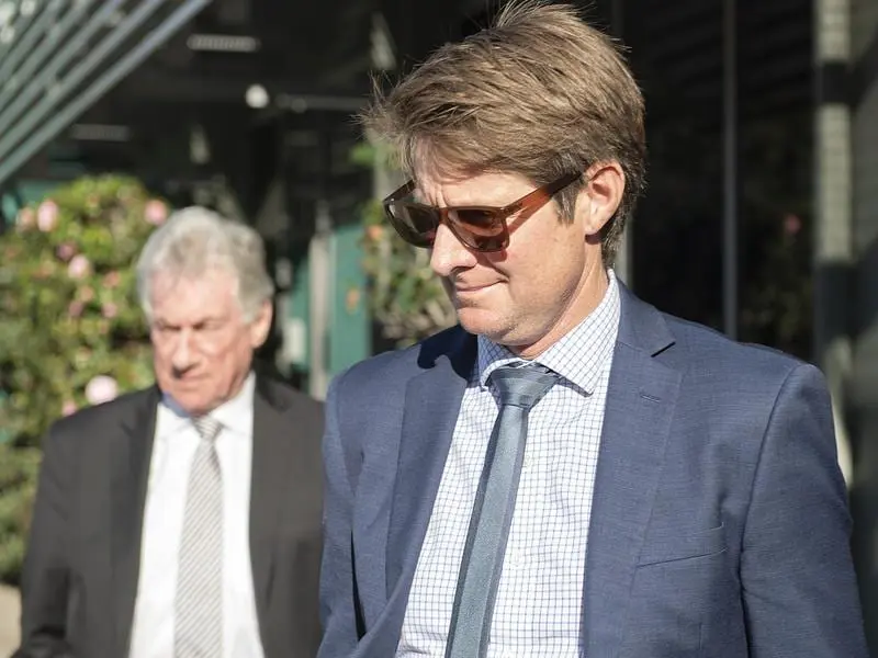 Victorian trainer Jarrod McLean's disciplinary hearing has been adjourned till September. Trainer Jarrod McLean leaves a disciplinary hearing in Melbourne.