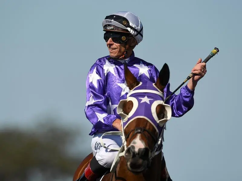 The Avenger with jockey Michael Cahill after winning at Eagle Farm.