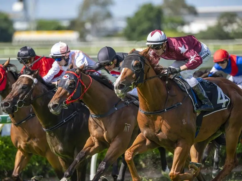 One Stryke (right) wins at Doomben.