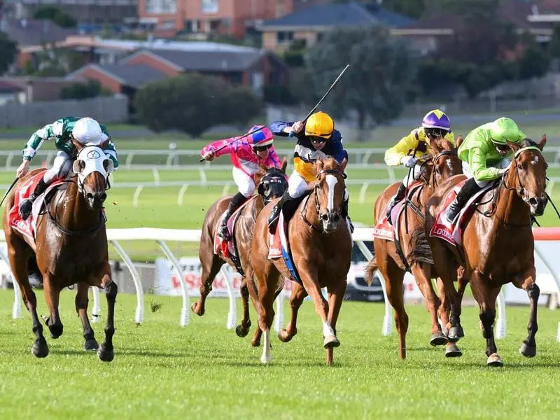 Talented (left) resumes to win at Sandown.