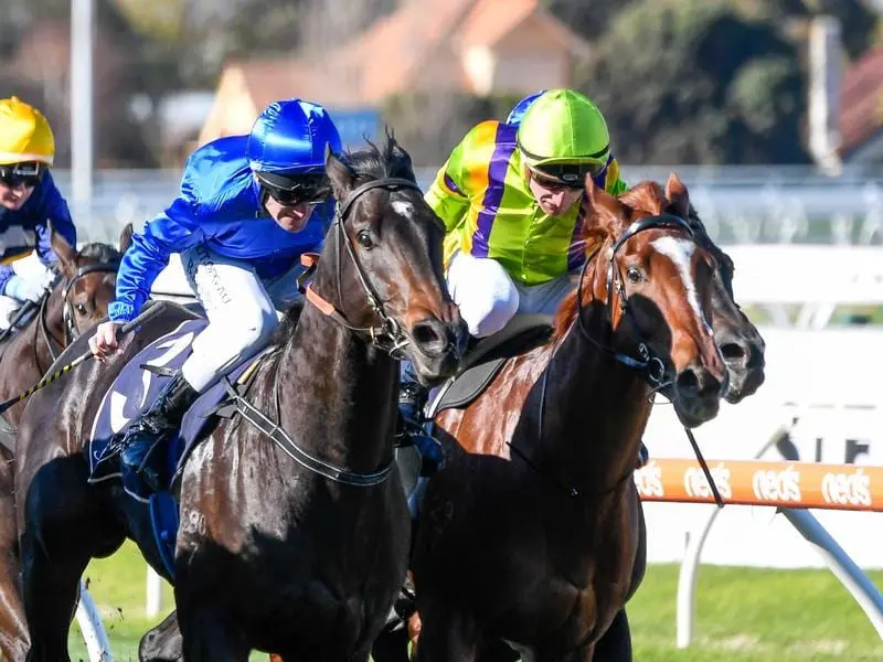 Valaquenta (left) wins at Caulfield.