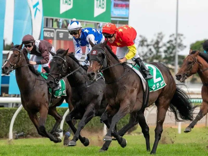 Hightail (right) has made up for past Gold Coast disappointments in winning a Group Three race. Hightail (right) wins the Group Three Gold Coast Guineas.