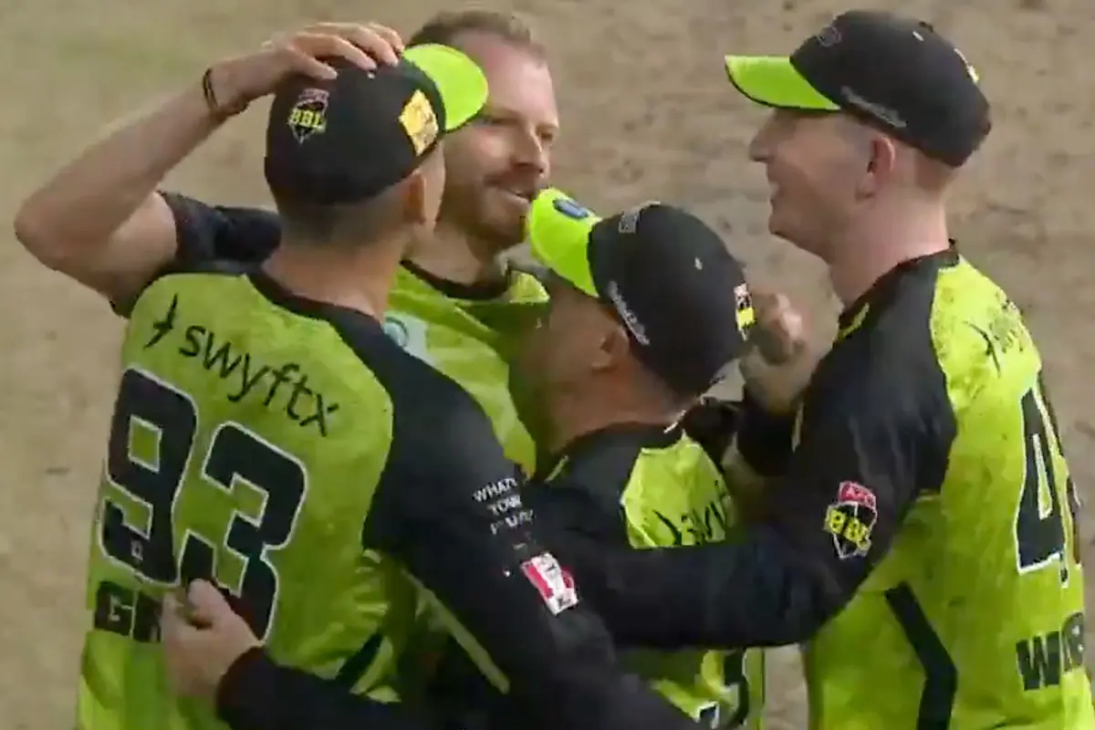 The Sydney Thunder celebrate Nathan McAndrew's five-wicket haul against the Melbourne Stars in the BBL14 finals