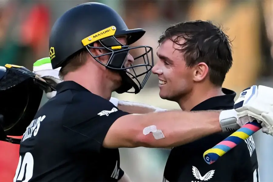 Tom Latham celebrates his century with Glenn Phillips during New Zealand's Champions Trophy win over Pakistan - February 19, 2025