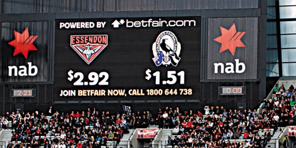 Live odds on the scoreboard at an AFL match