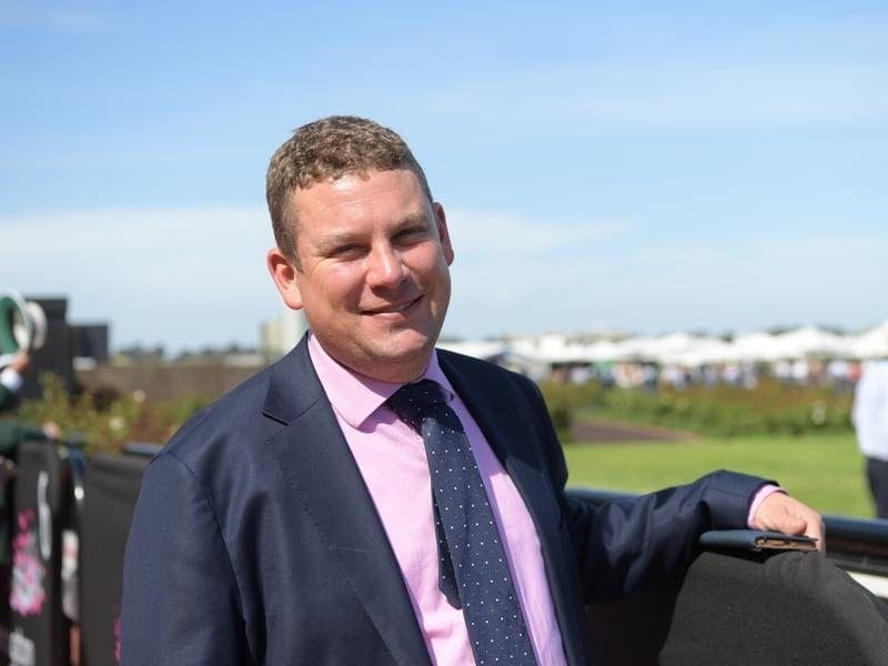 Co-trainer Trent Busuttin is looking forward to the return of Rising Red after an injury break. trent busuttin