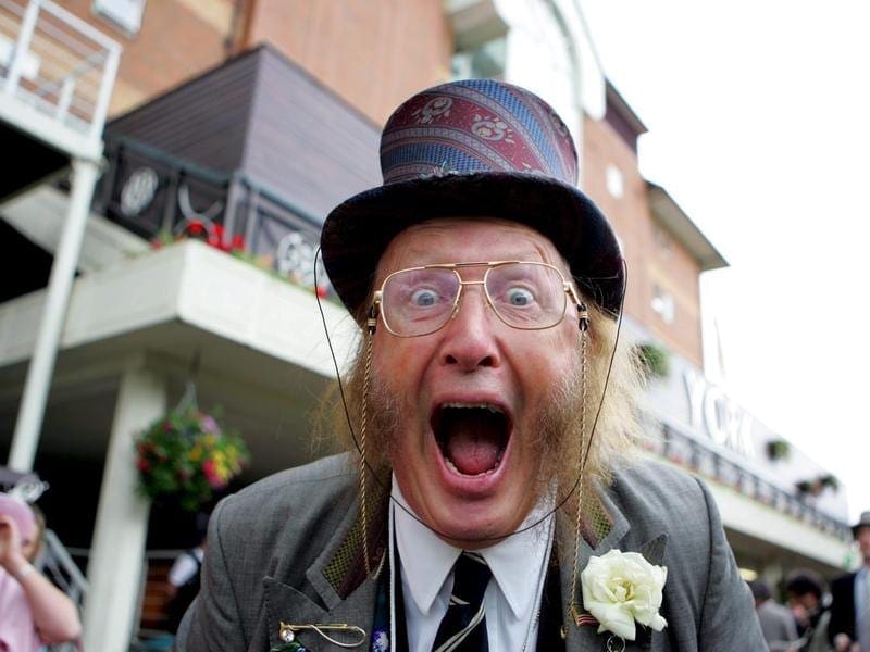 British racing character and presenter John McCririck had lung cancer his wife has revealed. john mccririck