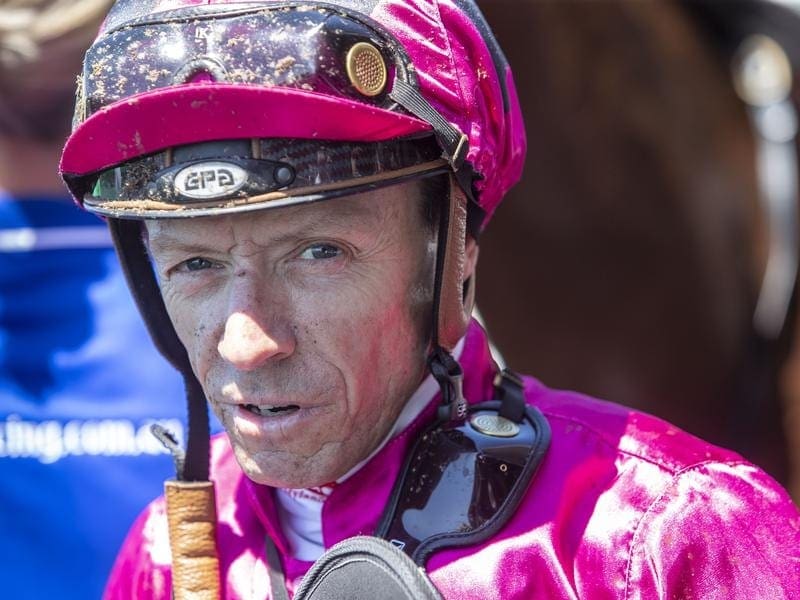 Michael Cahill has made the most of a late booking to win on Ocean Addict at Eagle Farm. Michael Cahill after winning on Ocean Addict.