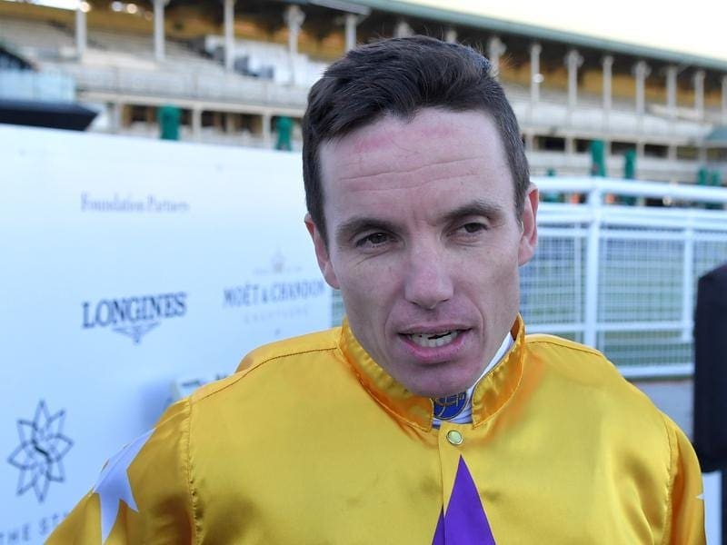Jockey Tim Clark's winning run has continued in the Newcastle Gold Cup aboard Hush Writer. tim clark