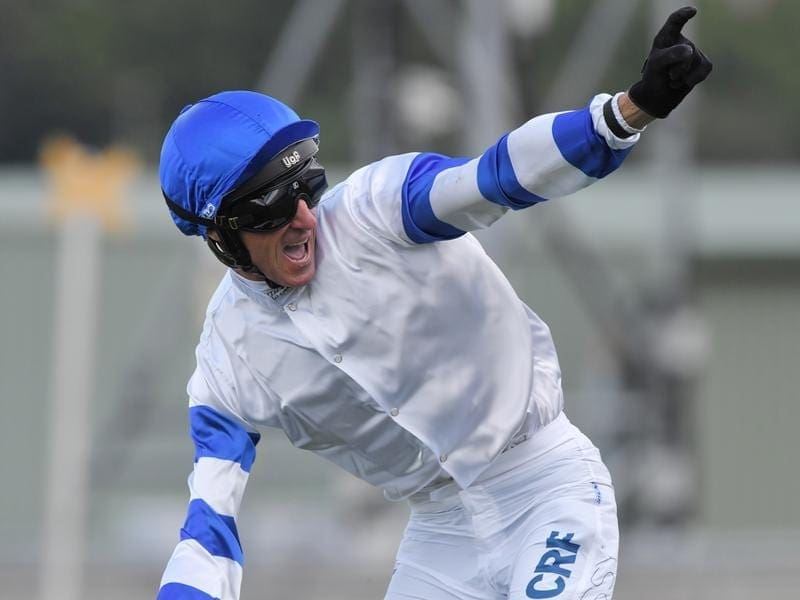 Jockey Glen Boss has teamed up with trainer Chris Waller to win the $1 million Epsom Handicap. Glen Boss salutes after winning the Epsom Handicap on Kolding.