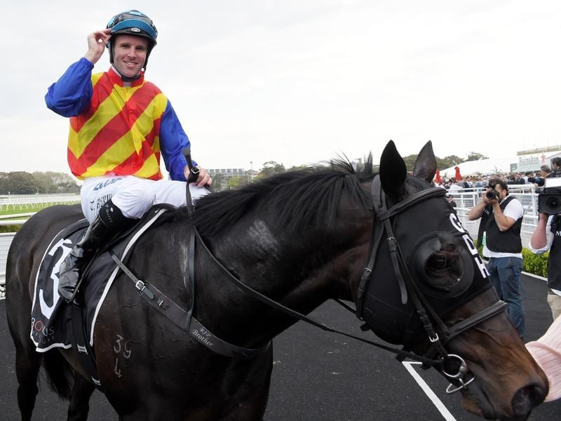 Jockey Tommy Berry returns to scale after riding Pierata to victory
