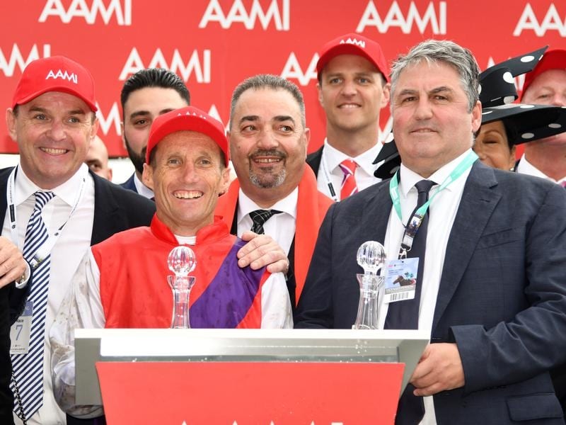 Jockey Damien Oliver and trainer Anthony Freedman (right).