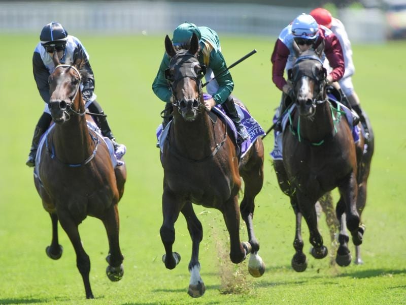 Jockey Tommy Berry rides Leviathan (centre) to victory