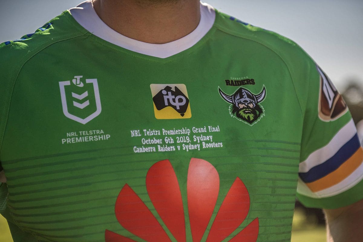 Players to cover NRL logo on shirts as pay dispute escalates